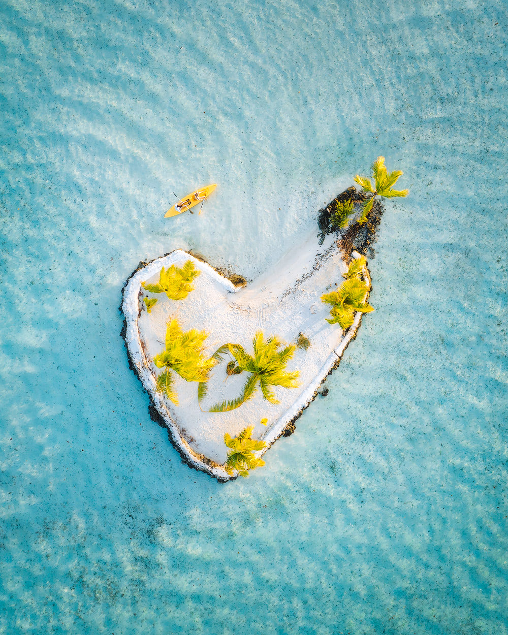 crystal clear waters of Le Taha'a