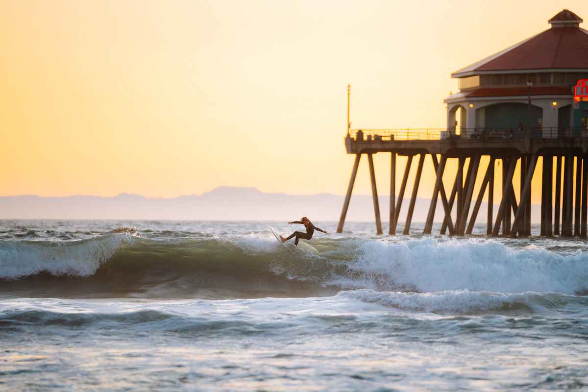 Orange County Travel Guide Everything You Need to Know- Huntington Beach Surfer