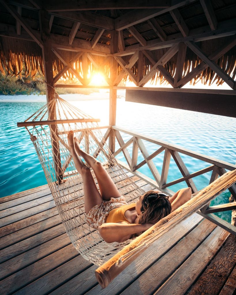 Enjoying sunset at Relais Royal Tikehau How To Visit Different Islands In Tahiti - Tikehau