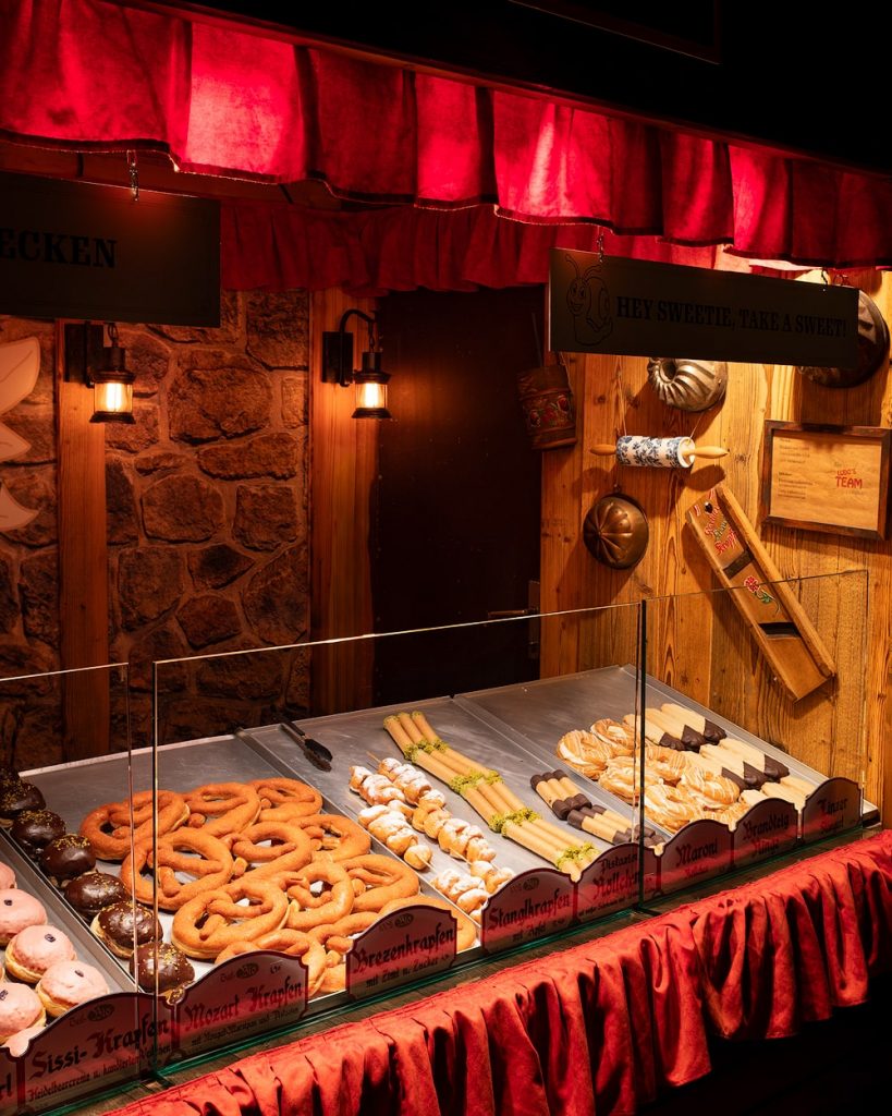 A First-Timer's Guide to Visiting Vienna Christmas Markets - Altes AKH Christmas market - Vienna Weihnachtsdorf Campus Universitat Wien Food Stall Desserts